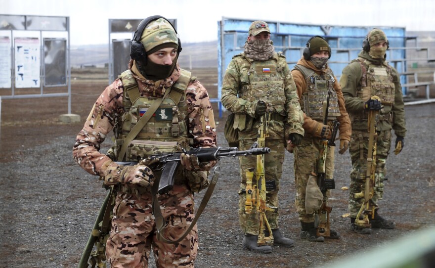Russian troops take part in drills in southern Russia, near the border with Ukraine, on Dec. 14. Some 100,000 Russian troops are in the border area, raising concern about another Russian invasion into Ukraine. Russian forces seized the Crimean Peninsula from Ukraine in 2014 and remain there to this day.