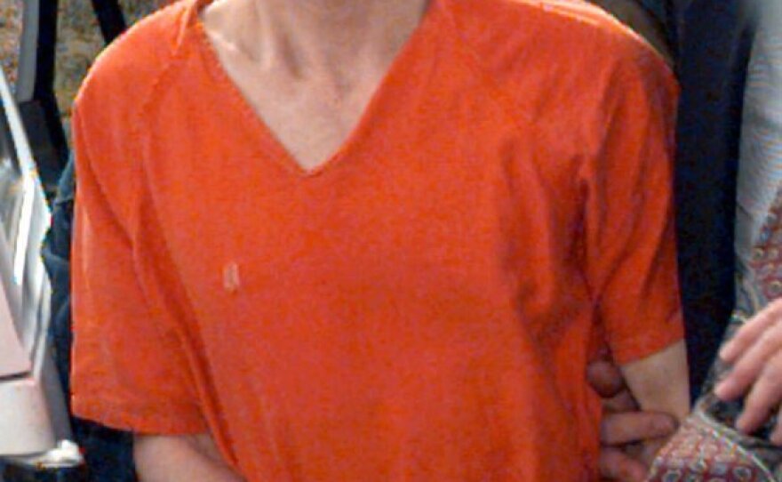 Unabomber Ted Kaczynski is escorted into the federal courthouse in Helena, Mont., Thursday, April 4, 1996.