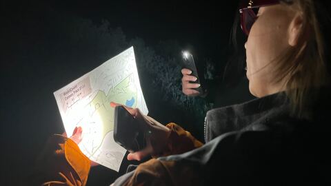 Volunteers for the Point-in-Time Count looking over their map as they search for unhoused individuals, Jan. 29, 2026.