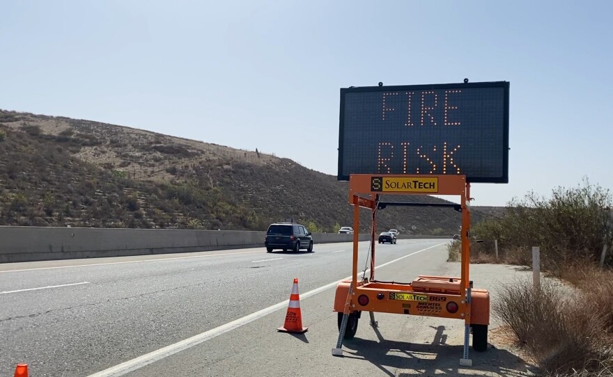 Sign on Highway 76 near Fallbrook and Bonsall warning of SDGE power outages and fire risk. October 26, 2020