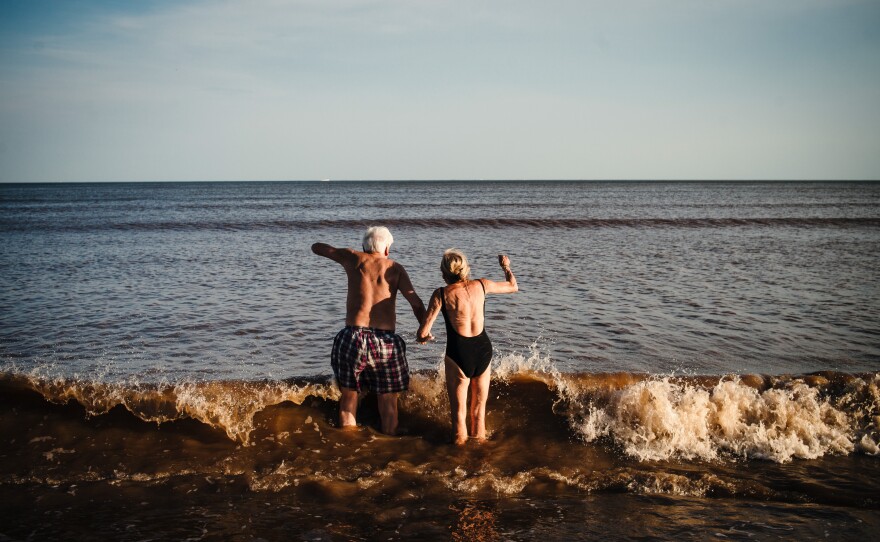 A couple holding hands on Pocitos Beach on January 22, 2016, in Montevideo, Uruguay, captivated the photographer.