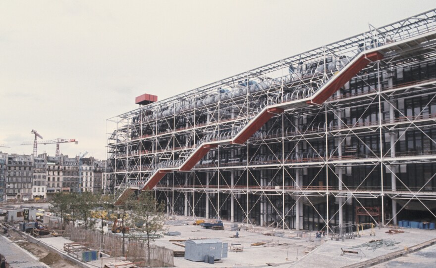 The design of the Pompidou Center, shown here under construction before it was inaugurated in January 1977, was compared by some to an oil refinery.