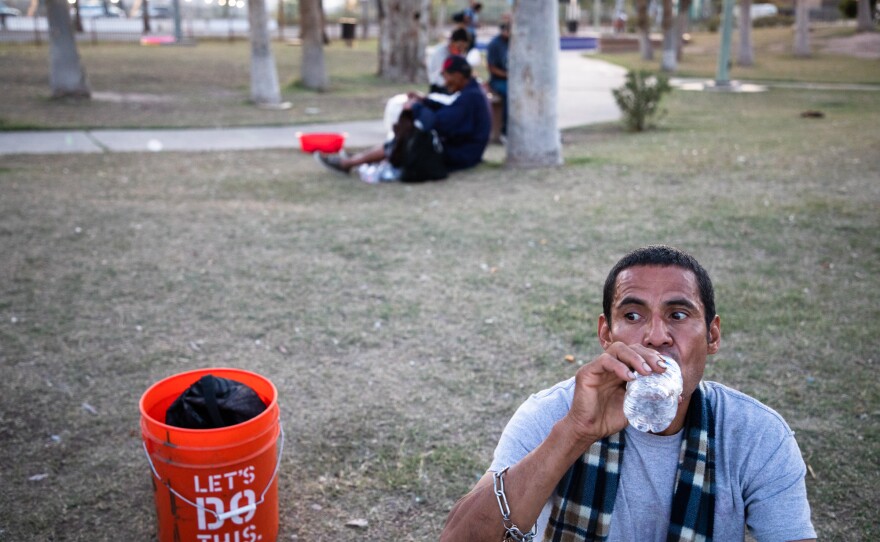 Jesse Reyes sits in Calexico's Border Friendship Park during the Brown Bag Coalition's nightly dinner, April 21, 2020.
