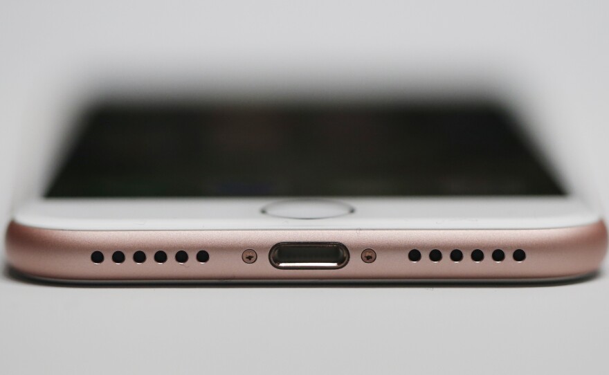 The new Apple iPhone 7 lacks a separate headphone jack, which makes people wonder how they can charge the phone while listening to music through a wired headphone via the Lightning connector. Apple's answer: a separate dock that starts at $39.