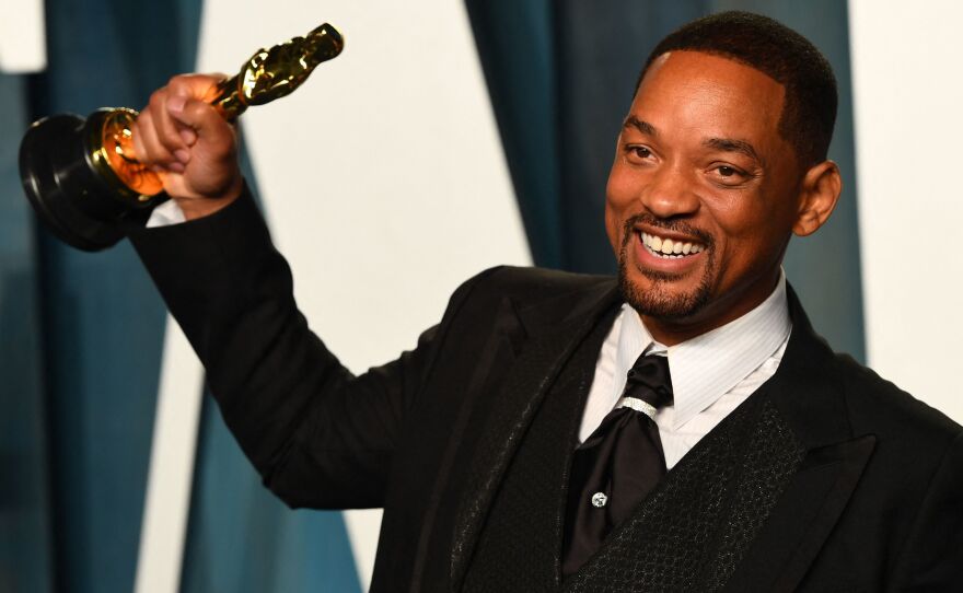 <strong>Hear the story: <a href="https://www.npr.org/2022/03/28/1089115636/oscars-2022-will-smith-acceptance-speech-chris-rock">Should Will Smith have been allowed to collect an Oscar after he slapped Chris Rock?</a></strong> Will Smith holds his Oscar for best actor in a leading role for <em>King Richard</em> at the 2022 Vanity Fair Oscar Party.