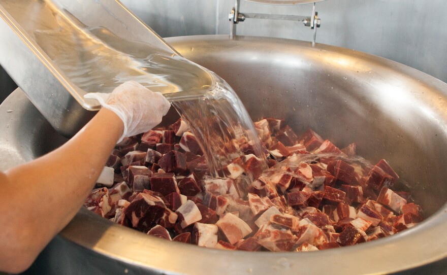 That goat meat had better be swimming in water for a nice, long simmer, says Kevin Onyona. Spices and vegetables will be tossed in later.