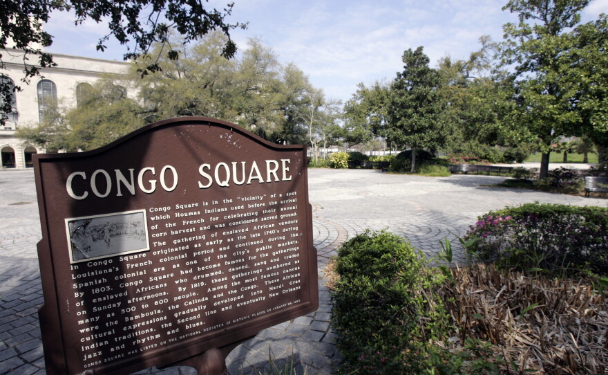 A sign at New Orleans' Congo Square commemorating the site's historical importance, captured shortly after the marker was posted in 2008.