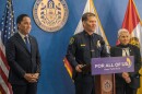 Newly appointed San Diego Police Chief Scott Wahl (center) speaks at a press conference alongside San Diego Mayor Todd Gloria (left) on March 21, 2024.