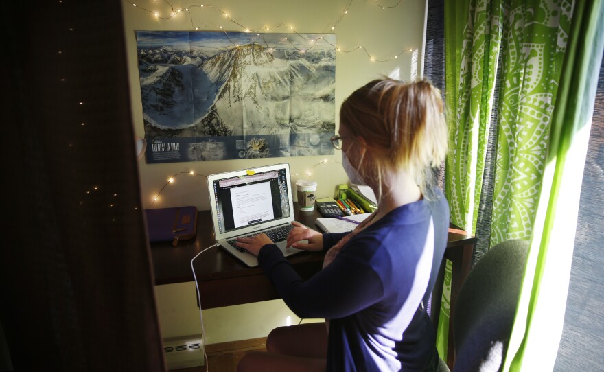 For her contact-tracing calls, Bellatti set up a desk in her living room, with curtains for privacy.
