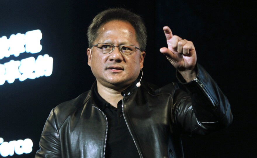 In this file photo, Nvidia CEO Jensen Huang delivers a speech about AI and gaming.