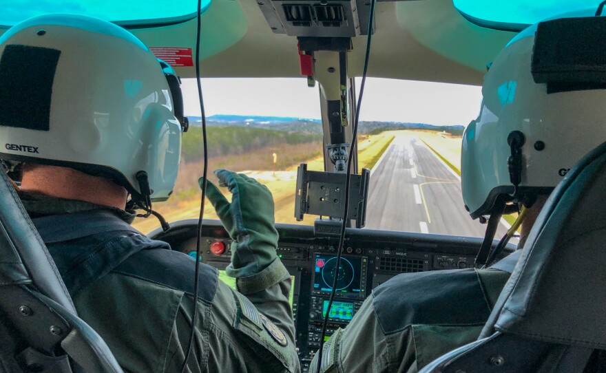 Pilots Jerry Griffin (L) of the Birmingham Police Department and Jonathan Johnson of the Jefferson County Sheriff's Office conduct a helicopter training flight using new virtual reality technology.