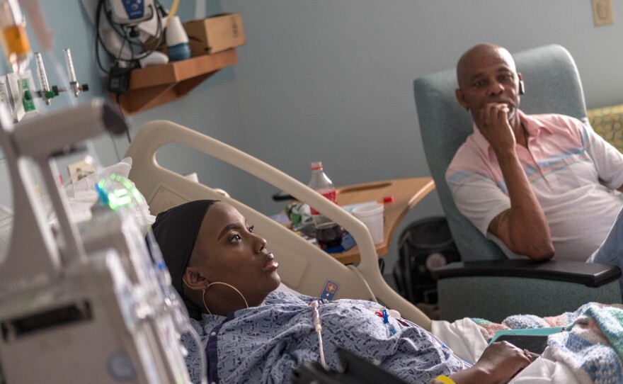 In July, Gray was recovering after a medical procedure that infused billions of her own bone marrow cells back into her body after they had been modified using the gene-editing technique CRISPR. Her father, Timothy Wright (right), traveled from Mississippi to keep her company.