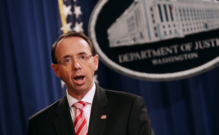 U.S. Deputy Attorney General Rod Rosenstein holds a news conference at the Department of Justice on Friday in Washington, D.C. Rosenstein announced indictments against 12 Russian intelligence agents for hacking computers during the 2016 presidential election.