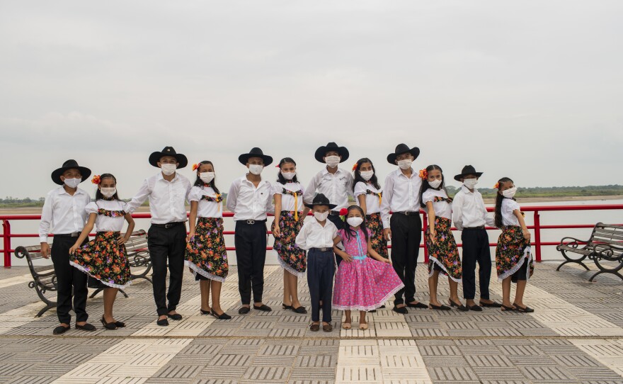 Alma Llanera's main group on Orocué's pier on the Meta River in 2020. During one of the hardest stages of the pandemic, when nobody and nothing was happening or happening outside, schools stopped, the lack of connectivity and virtual platforms made the regions of Colombia suffer even more from isolation and access to education.