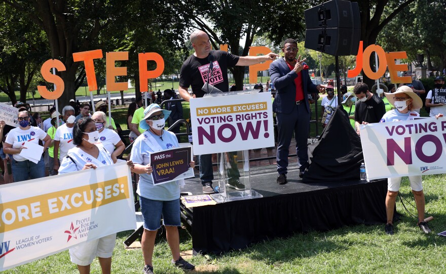 Civil rights leader Ben Jealous speaks at a voting rights rally outside the White House on Aug. 24 in Washington, D.C. Marches across the country are planned for Saturday.