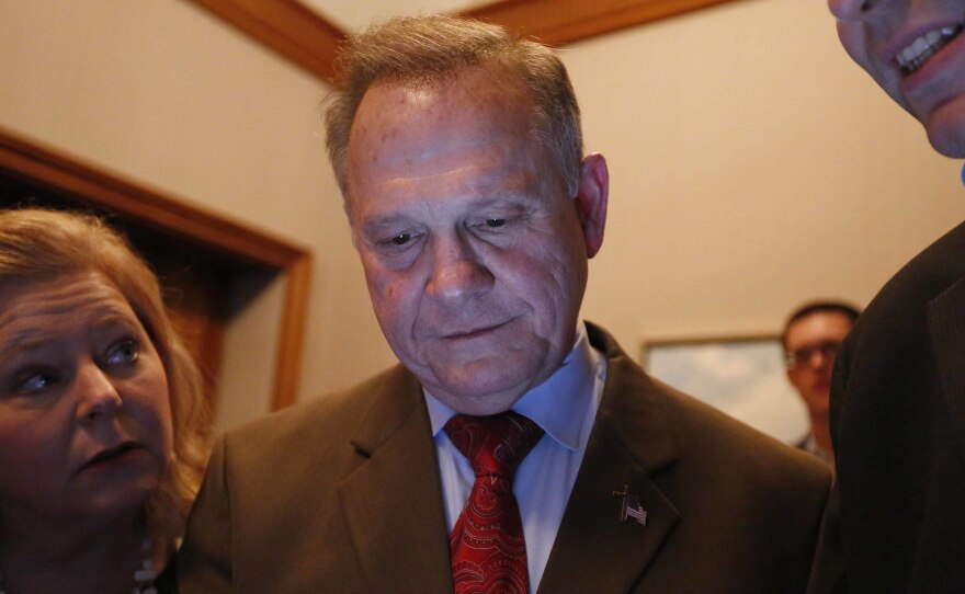 Roy Moore, seen here watching election returns in his Senate race, had callied on Alabama officials to not certify the results of the special election that he lost to Democrat Doug Jones. An Alabama judge has rejected the request.