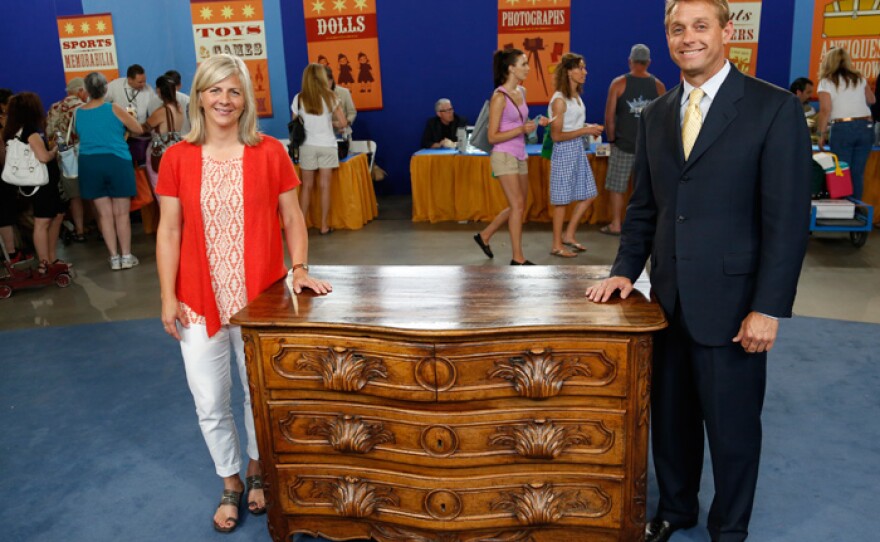 Brian Witherell (right) appraises a Rococo chest of drawers, ca. 1750, for $7,000 to $10,000 in Boise, Idaho.