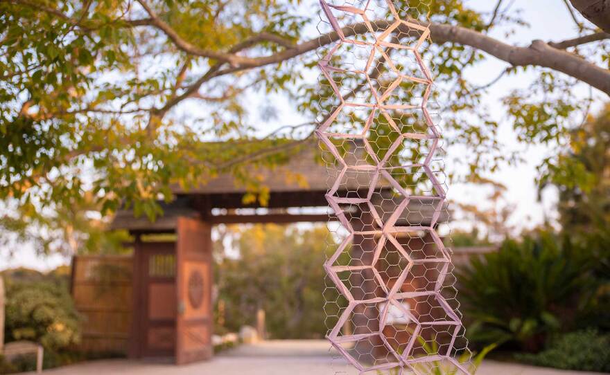 Kristi Lin used the landscape design concept of "borrowed scenery" in her work, framing other landscapes in the Japanese Friendship Garden with her weavings.