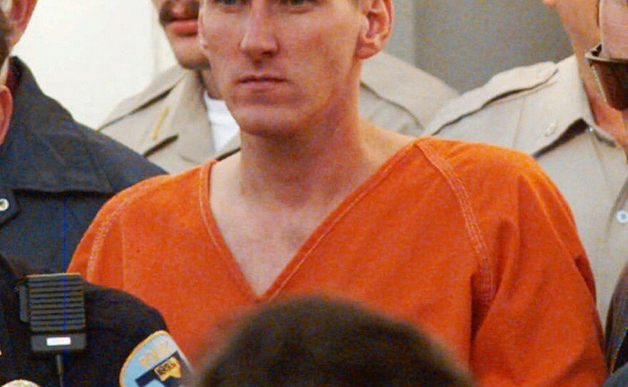 Oklahoma City bombing suspect Timothy McVeigh is escorted by law enforcement officials from the Noble County Courthouse in Perry, Okla.