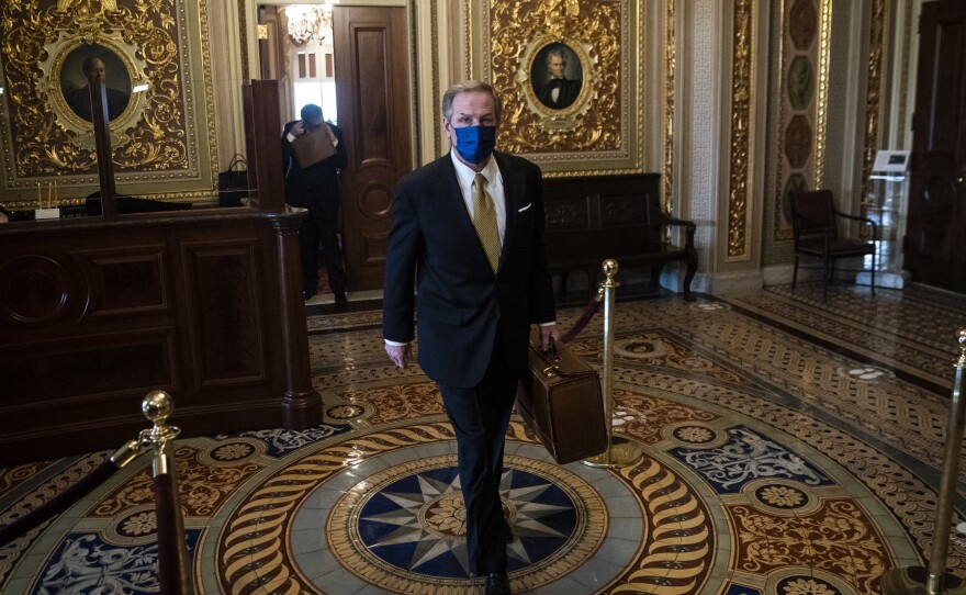 Michael van der Veen, lawyer for former President Donald Trump, walks to the Senate floor through the Senate Reception room on the fourth day of the Senate Impeachment trial for former President Donald Trump.