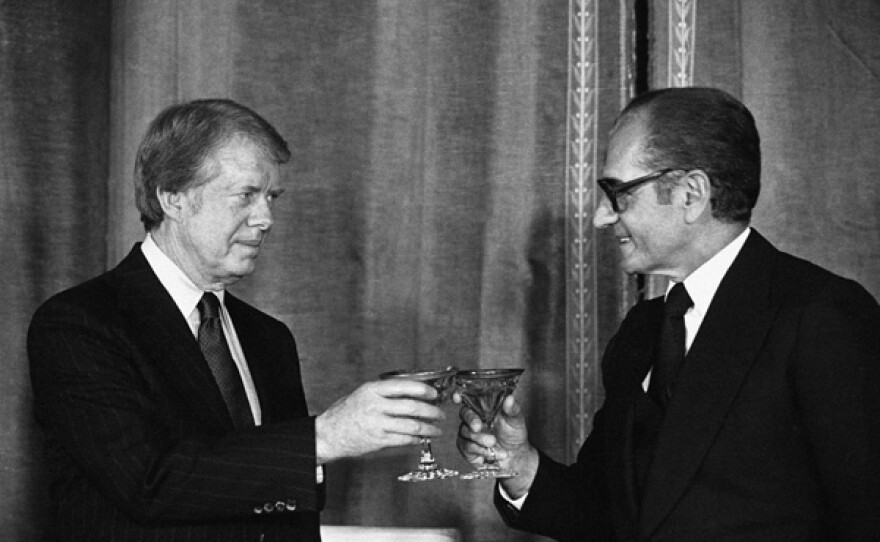 Jimmy Carter and Mohammad Reza Pahlavi in formal dinner in the Niavaran Palace in Tehran, Iran. Dec. 31, 1977.