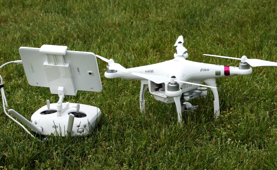 "These basically fly themselves; they're all computerized," Thomas Pfarr says about drones like his DJI Phantom quadcopter.