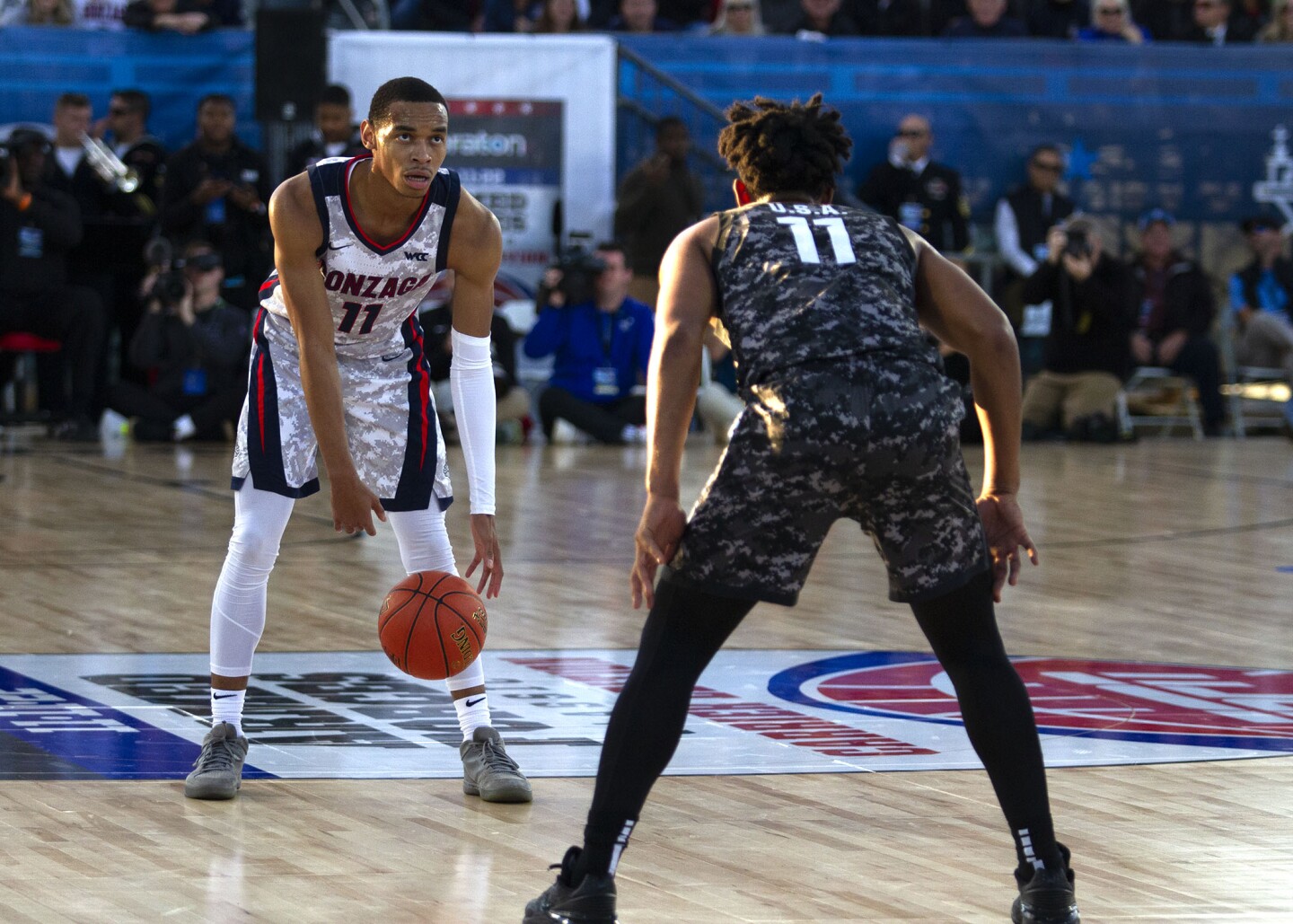 MSU guard A.J. Hoggard guards Gonzaga guard Nolan Hickman as he dribbles the ball in the Armed Forces Classic on board USS Abraham Lincoln in San Diego on Nov. 11, 2022.