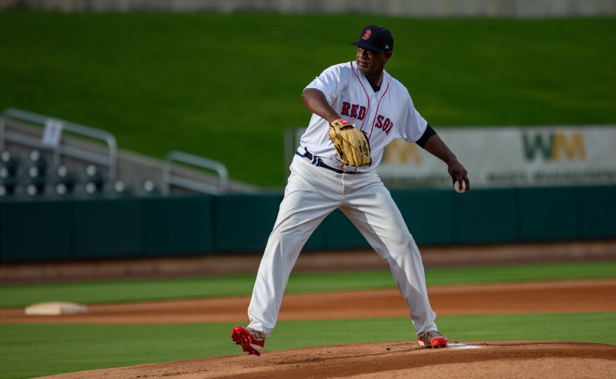 Jimmy Williams, 54, winds up to deliver a pitch during a recent game in Birmingham, Ala. Williams played 18 years in the minor leagues and is happy to be pitching again at a professional ballpark.