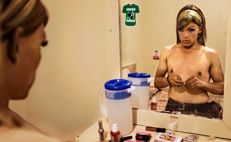 Oscar Villareal, 28, lived in Wisconsin as a boy, married and had a son, returned to his native Tijuana, became a sex worker (above, he makes himself up as his female alter ego, Ale), binged on meth, has tested positive for HIV.