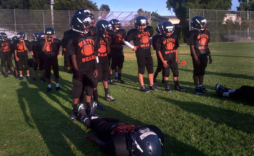 The Los Angeles Police Department helped launch the Watts Bears, a team of the Pee Wee division of Pop Warner football, in 2012. The players come from the neighborhood and practice at a park that's considered a neutral site between local gangs.