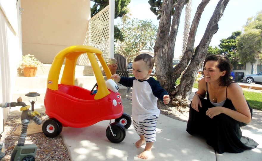 Kerri De Nies plays with her son, Gregory Mac Phee at their home in San Diego. Gregory tested positive for adrenoleukodystrophy, a rare brain disorder that affects 1 in about 18,000 babies. Roughly 30 percent of boys with the genetic mutation go on to develop the most serious form of the disease.