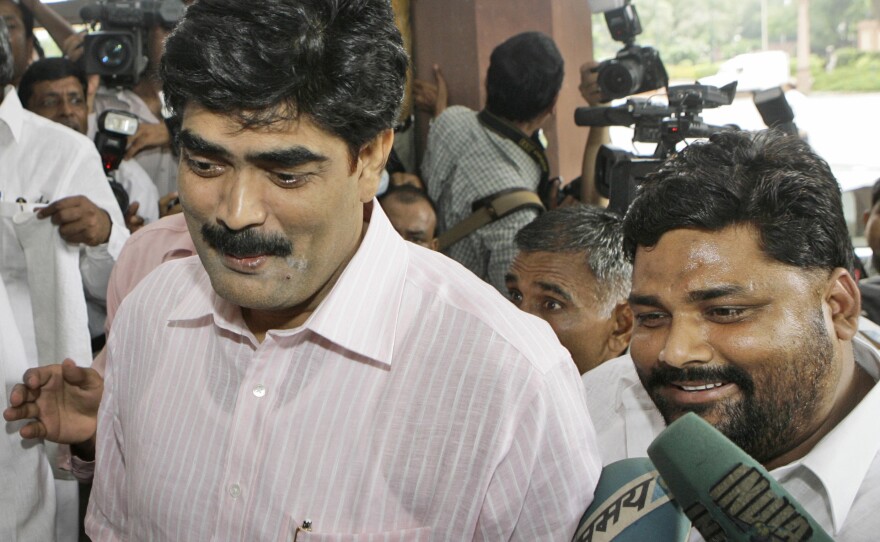Indian lawmakers Mohammed Shahabuddin (left) and Pappu Yadav were both serving jail sentences when they arrived at India's Parliament for a vote in 2008.