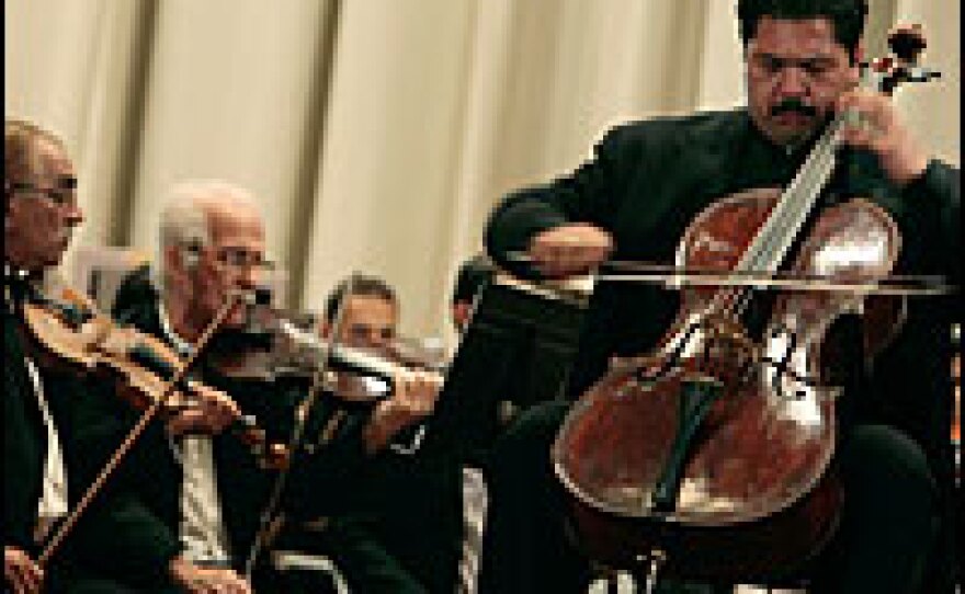 Karim Wasfi performs with the Iraqi National Symphony Orchestra in Baghdad's Green Zone.