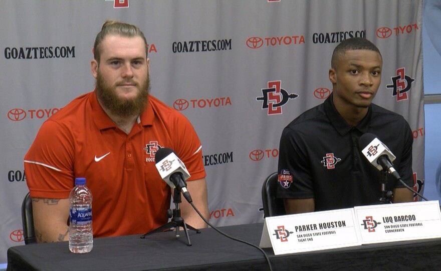San Diego State football players Parker Houston and Luq Barcoo at a news conference on Oct. 1, 2019.