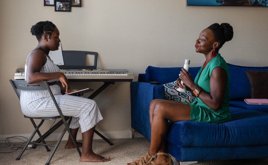 Terri Logan (right) practices music with her daughter, Amari Johnson (left), at their home in Spartanburg, South Carolina.