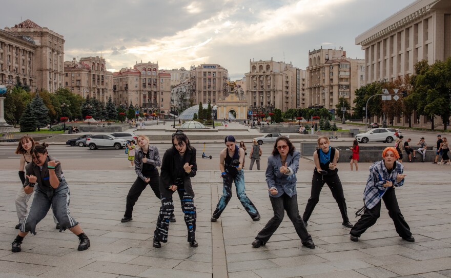 Phantom Blue K-pop dance squad performs and records in Maidan Square.