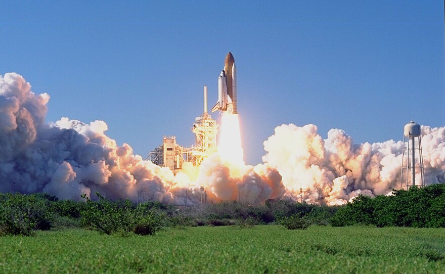 Space shuttle Discovery lifts off on Oct. 29, 1998. Discovery carried a crew of six, including Payload Specialist John H. Glenn Jr., senator from Ohio, marking his second voyage into space after 36 years. Glenn returned as the world's oldest astronaut to the high frontier he pioneered for America 36 years prior.