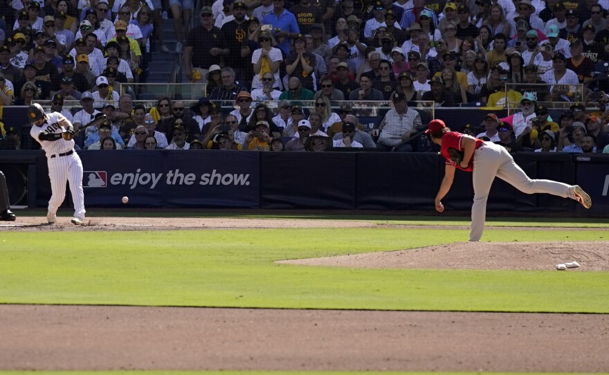 San Diego Padres' Austin Nola grounds out against his brother Philadelphia Phillies starting pitcher Aaron Nola during the second inning in Game 2 of the baseball NL Championship Series between the San Diego Padres and the Philadelphia Phillies on Wednesday, Oct. 19, 2022, in San Diego.