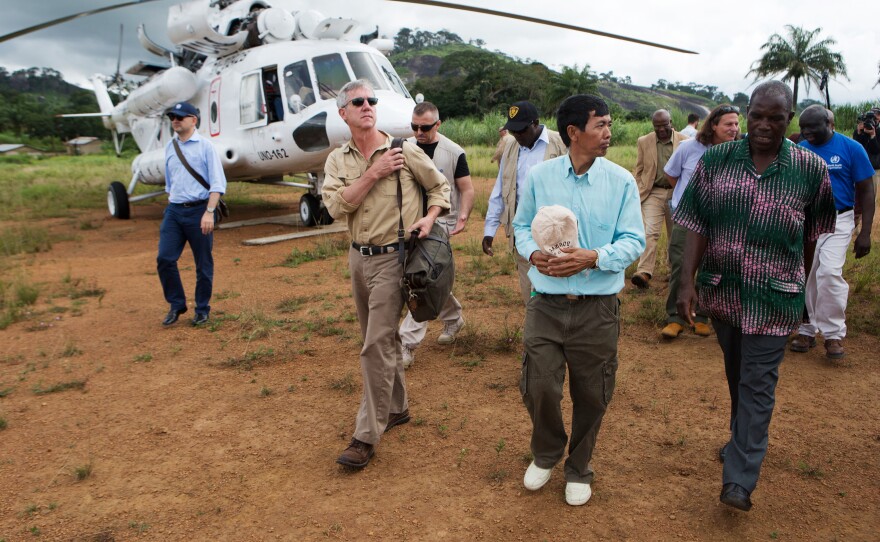 Anthony Banbury (second from left) just completed his final tour of West Africa before stepping down as the head of U.N.'s Ebola mission.