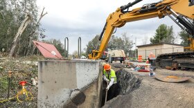 Workers exvacating and installing new pipes on the historic First Aqueduct in North San Diego County in this undated photo.