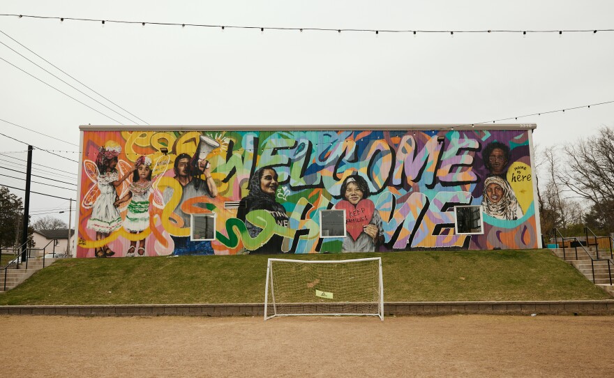 The Tennessee Immigrant & Refugee Rights Coalition's mural says "Welcome Home."
