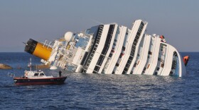 The cruise ship Costa Concordia lies stricken off the shore of the island of Giglio, on January 14, 2012 in Giglio Porto, Italy. 