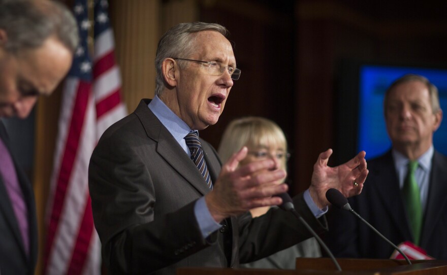 Senate Majority Leader Harry Reid (D-Nev.) speaks to the media on Thursday after passing the so-called nuclear option, which changes the Senate rules to eliminate the use of the filibuster on presidential nominees except those to the Supreme Court.