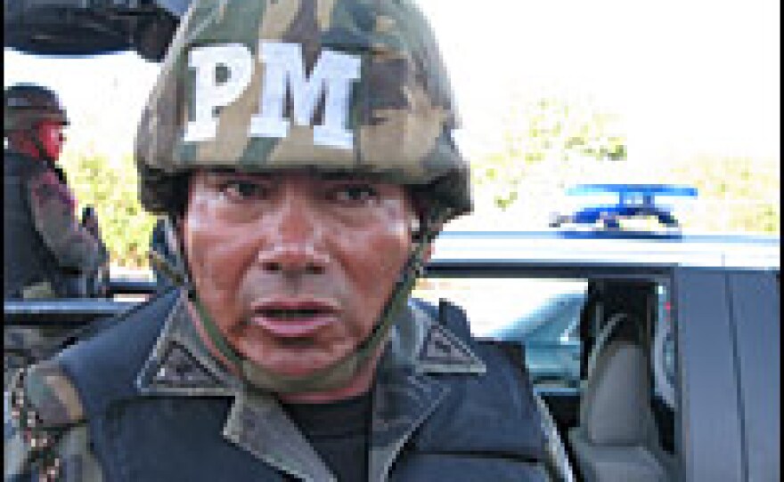 Lt. Jesus Guadalupe Reyna de Ramirez is among the 10,000 Mexican soldiers and federal police deployed in Juarez, Mexico, across the Rio Grande from El Paso, Texas.