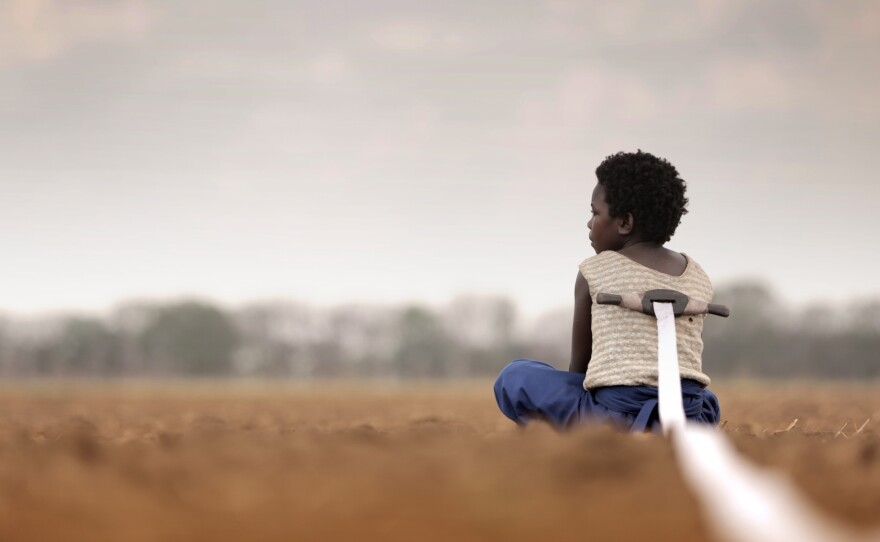 Shula (Maggie Mulubwa) is accused of being a watch and is forced to live tethered to a post in the new film from Zambia, "I Am Not A Witch."