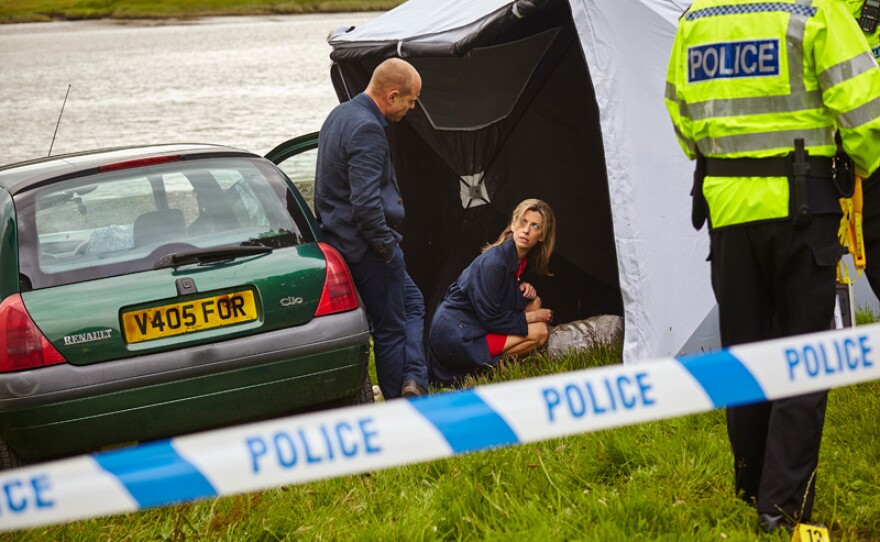 Davey (Matt Bardock) and Jane (Claire Goose) at the murder scene of Ellie in “Crash.”