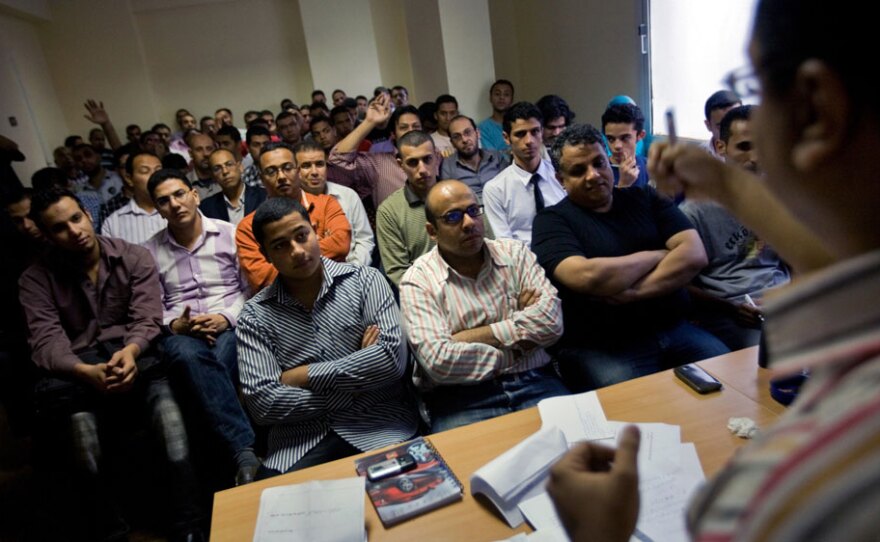 Volunteers packed into a room during a petition-drive training session in Cairo. Mohamed ElBaradei's National Association for Change movement has gathered 900,000 signatures on a petition to amend the constitution and end the stranglehold President Hosni Mubarak's ruling party has over elections.