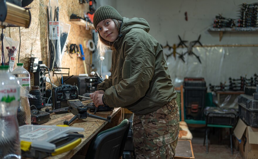 Yevhenia, 19, a reconnaissance drone pilot of the Khartiia 13th National Guard Brigade, works in a drone workshop in northeastern Ukraine earlier this year.