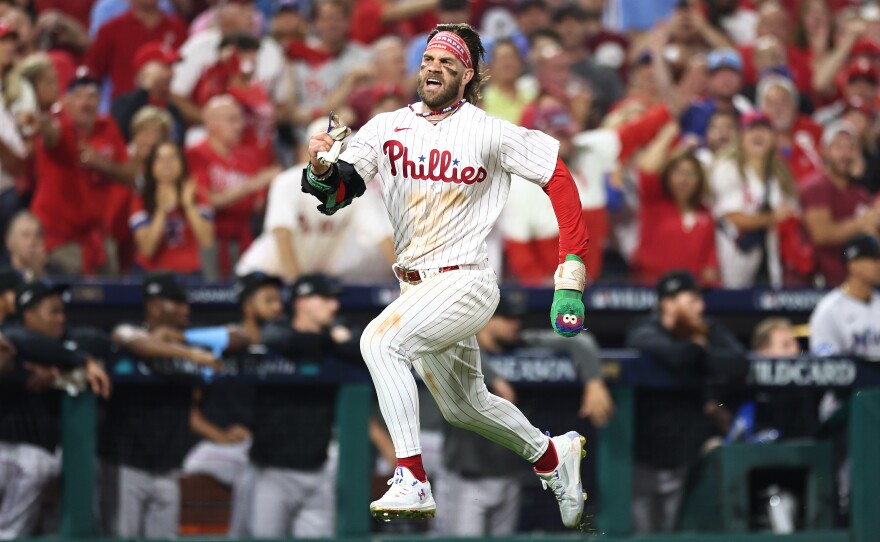 Bryce Harper of the Philadelphia Phillies sprints home during a game against the Miami Marlins on Oct. 3, 2023.