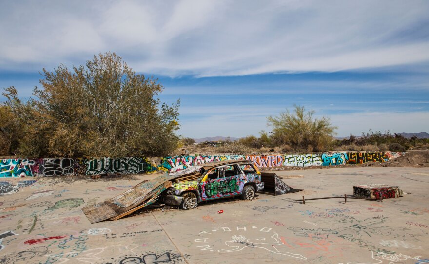 A car serves as the foundation for the Slab City skateboarding park, March 28, 2015.